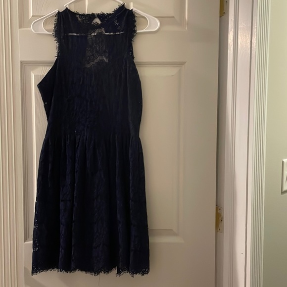 Xhilaration Dresses & Skirts - Navy blue lace dress with a keyhole back